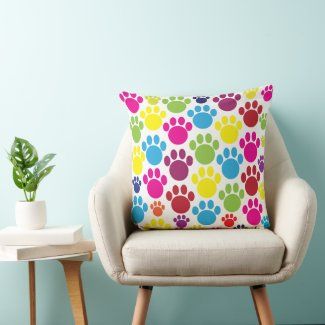 colorful_animal_paw_prints_throw_pillow-r2559b37acd244e7d8075a04b89b87c05_4gc22_8byvr_1024.jpg