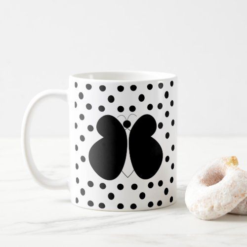 black_polka_dots_butterfly_coffee_mug-r7042ac5105f14cd4a5e2e94e542be04c_kz9a2_1024.jpg