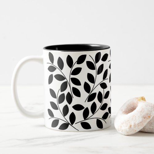 black_leaves_tropical_two_tone_coffee_mug-r6a0d08d34ed545d099fc0417baf5a690_kz9a0_1024.jpg